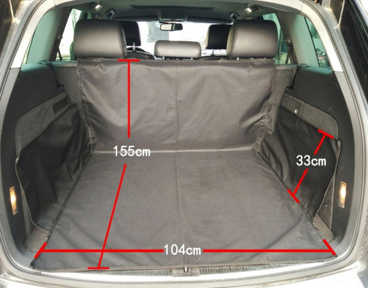 Car trunk with a black cargo liner and measurements indicated.
